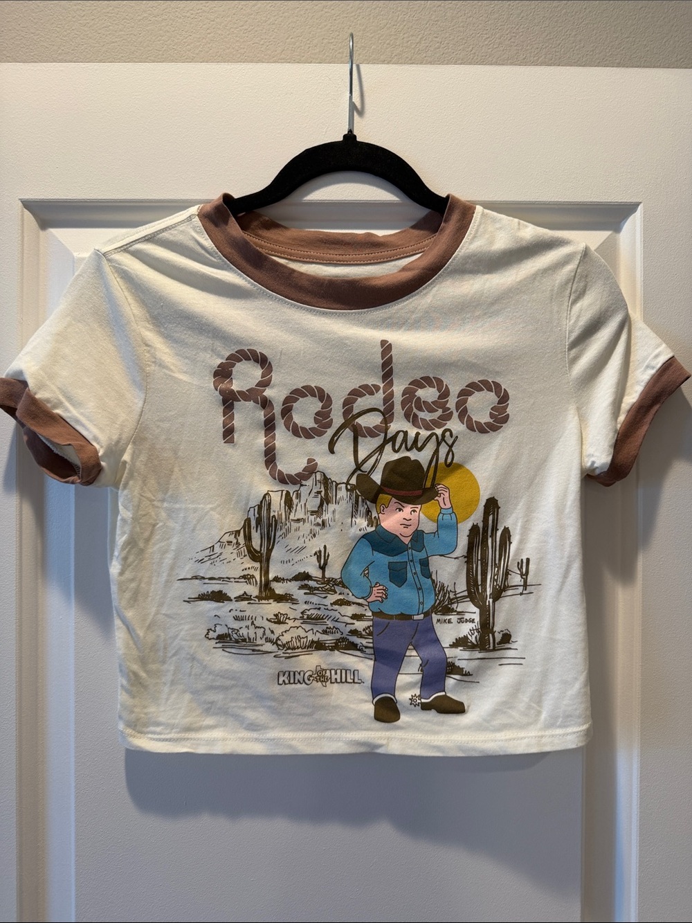 King of the Hill "Rodeo Days" Graphic Ringer Tee - Cream & Brown
